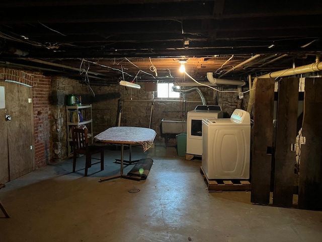 basement with separate washer and dryer