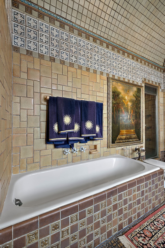 room details featuring tiled bath