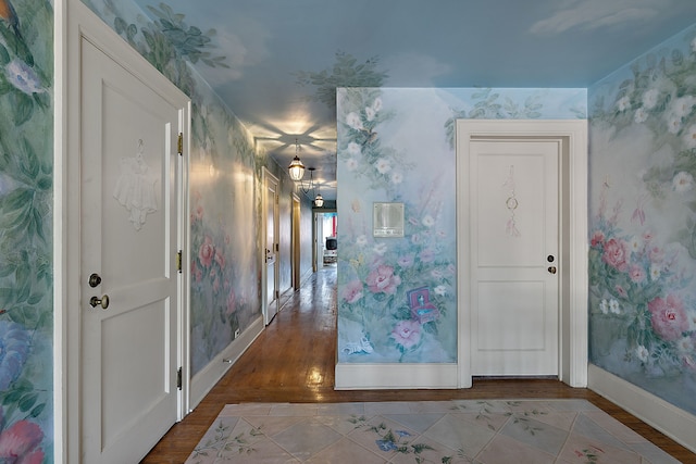 foyer entrance with light hardwood / wood-style floors