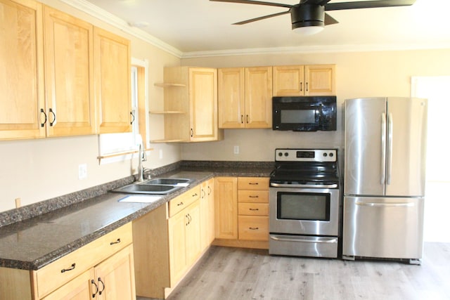 kitchen with ornamental molding, sink, light wood-type flooring, and appliances with stainless steel finishes