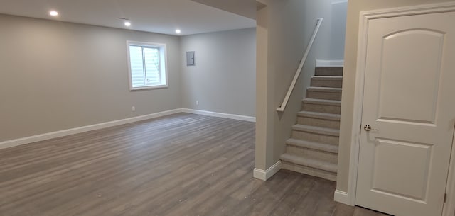 basement featuring dark wood-type flooring