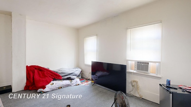 carpeted bedroom featuring cooling unit