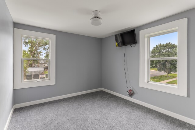 13437 E State Fair St, Detroit, MI 48205 - carpeted spare room with baseboards