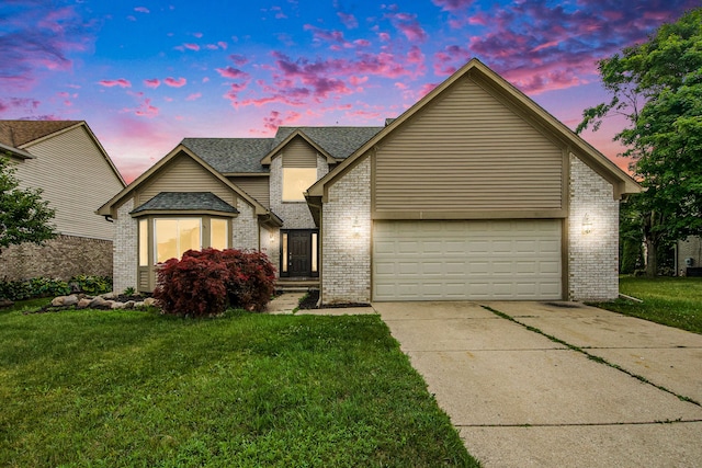 view of front of property with a yard