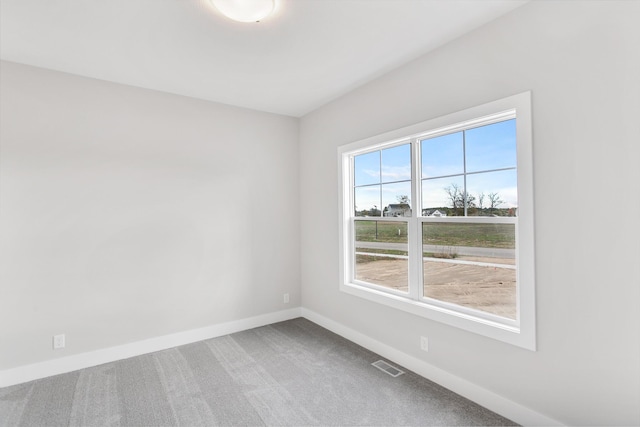 9139 Perry Ct, Zeeland, MI 49464 - spare room with baseboards and carpet flooring