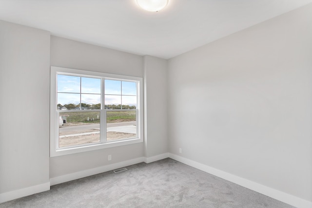 9139 Perry Ct, Zeeland, MI 49464 - unfurnished room featuring carpet flooring and baseboards