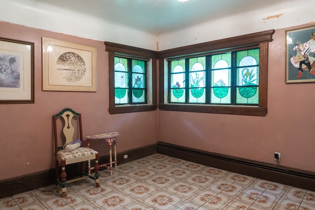 sitting room featuring a baseboard radiator