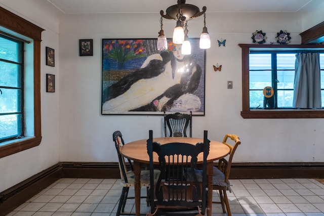 dining room featuring light tile patterned flooring