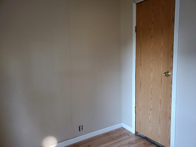 unfurnished room featuring light hardwood / wood-style floors