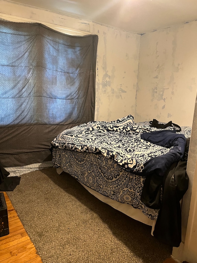 bedroom featuring hardwood / wood-style flooring