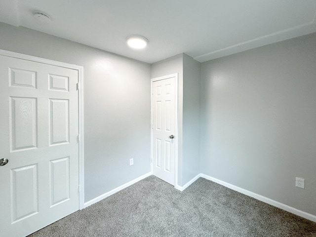 spare room with carpet flooring