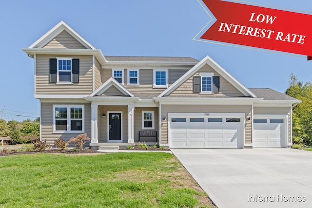 craftsman-style home with a garage and a front lawn