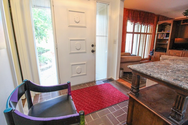 entrance foyer featuring a wealth of natural light