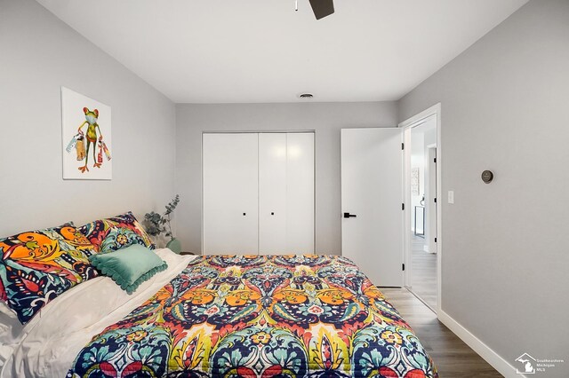 bedroom with ceiling fan, a closet, and light wood-type flooring