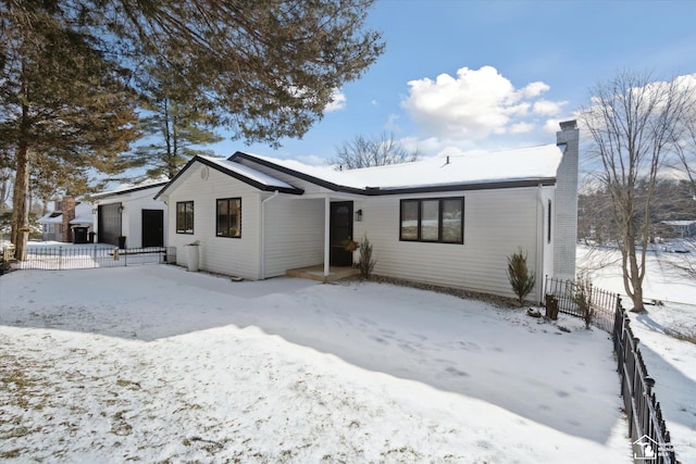 view of snow covered property