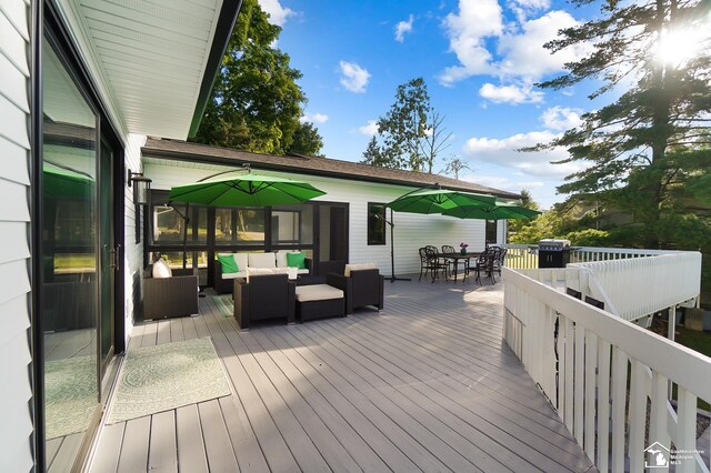 deck with an outdoor hangout area