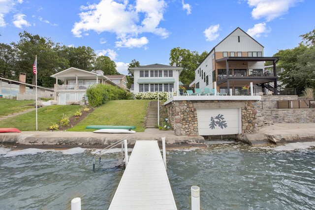 21945 Howell Dr, Cassopolis, MI 49031 - dock featuring stairs, a yard, and a balcony