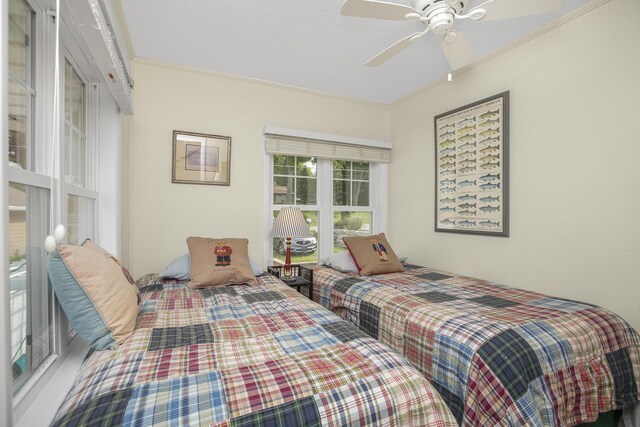21945 Howell Dr, Cassopolis, MI 49031 - bedroom featuring ornamental molding and ceiling fan