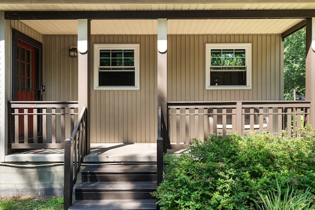 doorway to property with a porch