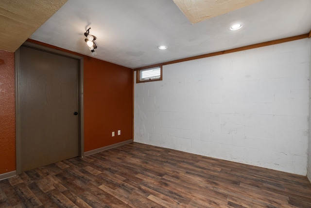 unfurnished room with dark hardwood / wood-style floors