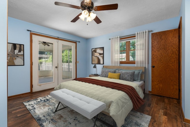 bedroom with french doors, dark hardwood / wood-style floors, multiple windows, and ceiling fan