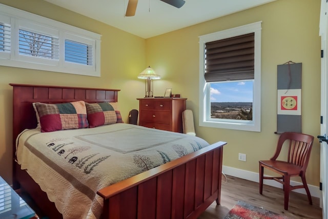 bedroom featuring ceiling fan and light wood-type flooring