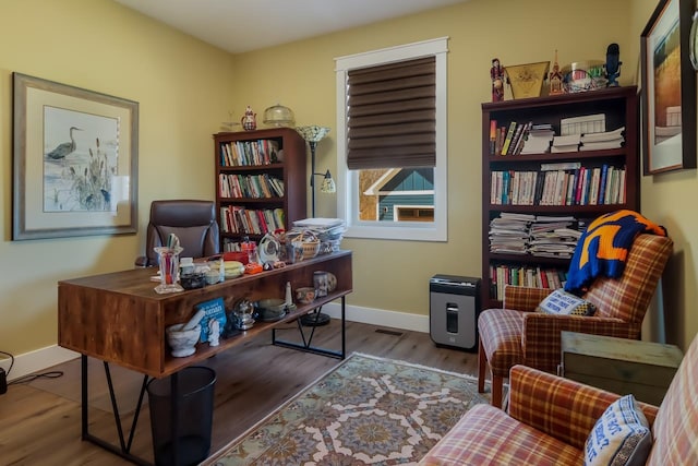 home office with light wood-type flooring