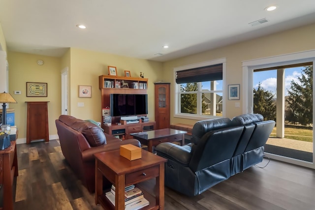 living room with dark hardwood / wood-style floors