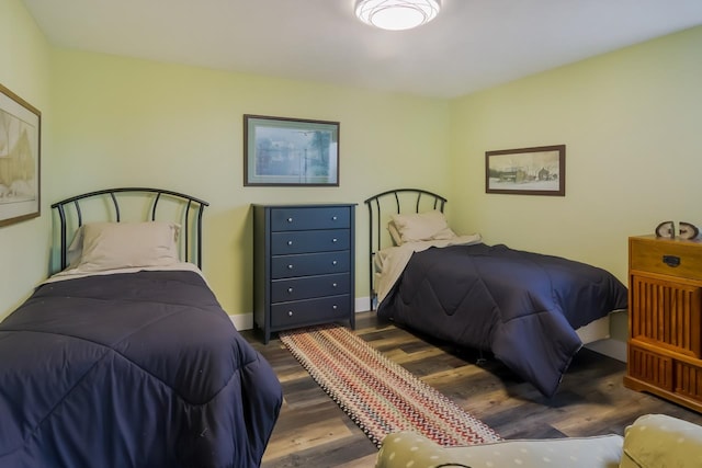 bedroom featuring dark hardwood / wood-style floors