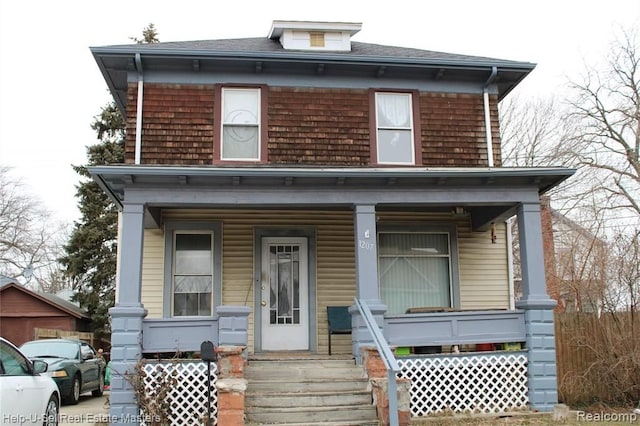 view of front of property featuring covered porch