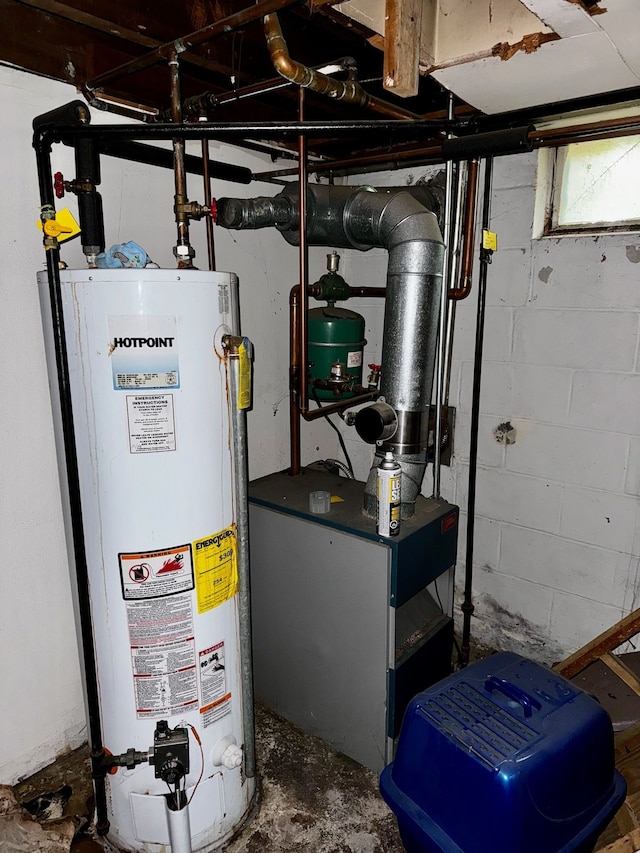 utility room with gas water heater