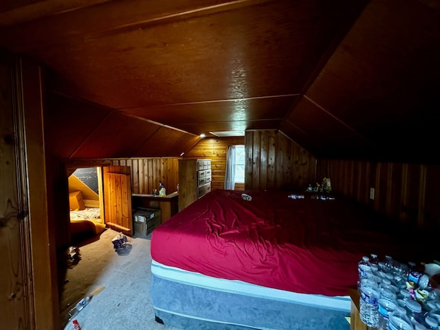 bedroom with carpet and lofted ceiling