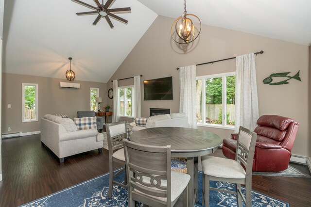 609 3rd St, Muskegon, MI 49445 - dining space with an AC wall unit, baseboard heating, a ceiling fan, high vaulted ceiling, and a fireplace