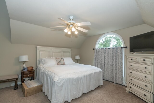 609 3rd St, Muskegon, MI 49445 - bedroom with lofted ceiling, light carpet, and a ceiling fan