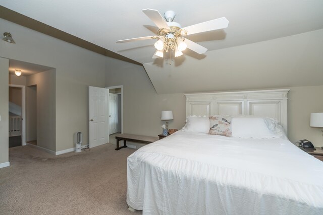 609 3rd St, Muskegon, MI 49445 - bedroom featuring light colored carpet, lofted ceiling, baseboards, and a ceiling fan