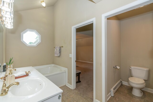 609 3rd St, Muskegon, MI 49445 - bathroom with baseboard heating, toilet, double vanity, a garden tub, and baseboards