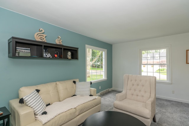 609 3rd St, Muskegon, MI 49445 - living area with baseboards and carpet