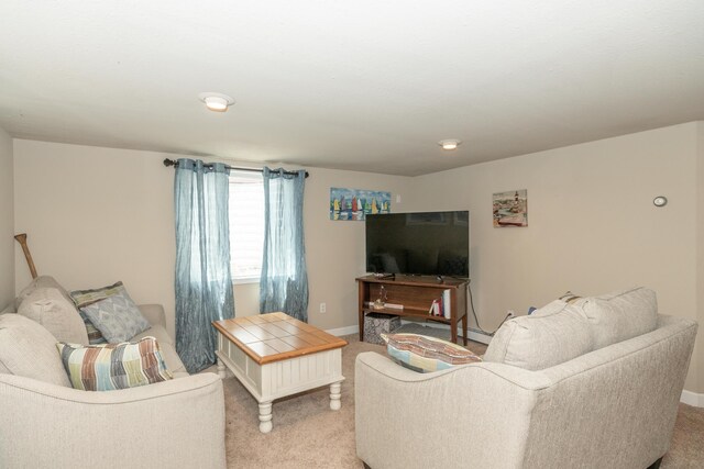609 3rd St, Muskegon, MI 49445 - living room with light carpet and baseboards