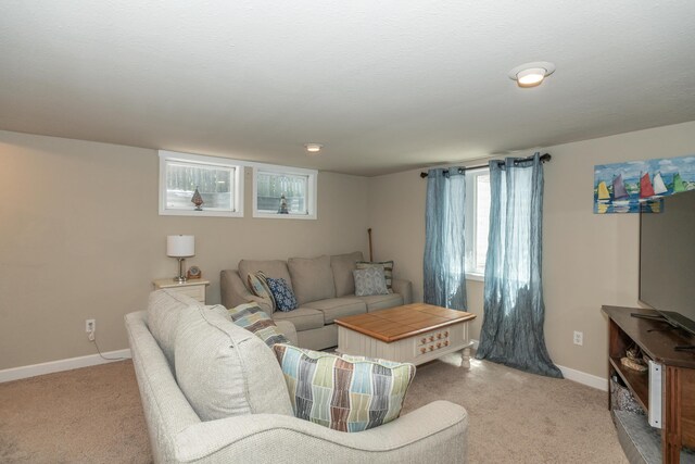 609 3rd St, Muskegon, MI 49445 - living room with light carpet and baseboards