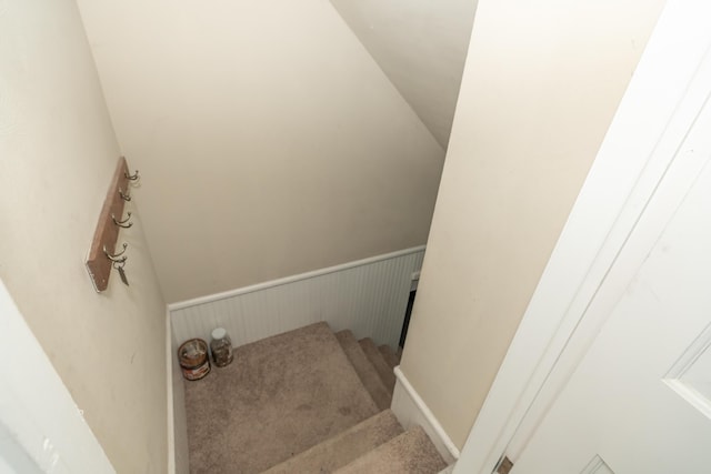 609 3rd St, Muskegon, MI 49445 - staircase featuring a wainscoted wall and carpet floors