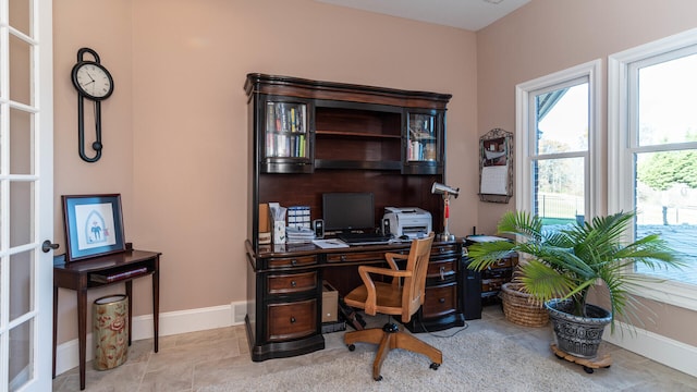 740 Greystone Dr, Chelsea, MI 48118 - tiled home office featuring baseboards