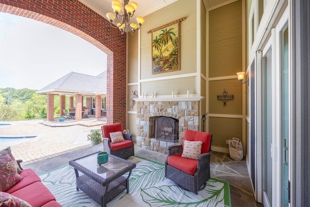 740 Greystone Dr, Chelsea, MI 48118 - view of patio / terrace featuring an outdoor pool and an outdoor living space with a fireplace