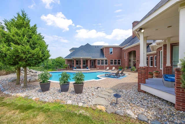 740 Greystone Dr, Chelsea, MI 48118 - swimming pool with a patio area