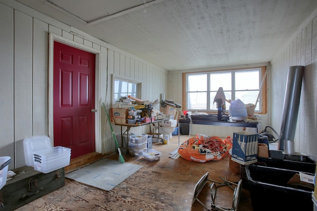 interior space featuring wood walls