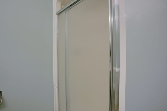 46070 Edgewater Dr, Chesterfield, MI 48047 - bathroom featuring a shower stall