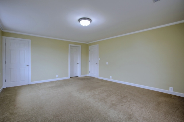 46070 Edgewater Dr, Chesterfield, MI 48047 - spare room featuring ornamental molding, baseboards, and carpet