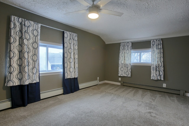 46070 Edgewater Dr, Chesterfield, MI 48047 - carpeted spare room with a baseboard radiator, a textured ceiling, a ceiling fan, and baseboards
