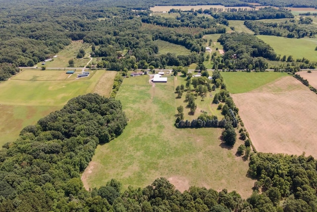 birds eye view of property featuring a rural view