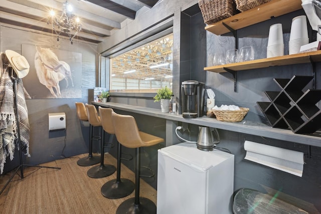 bar featuring beam ceiling