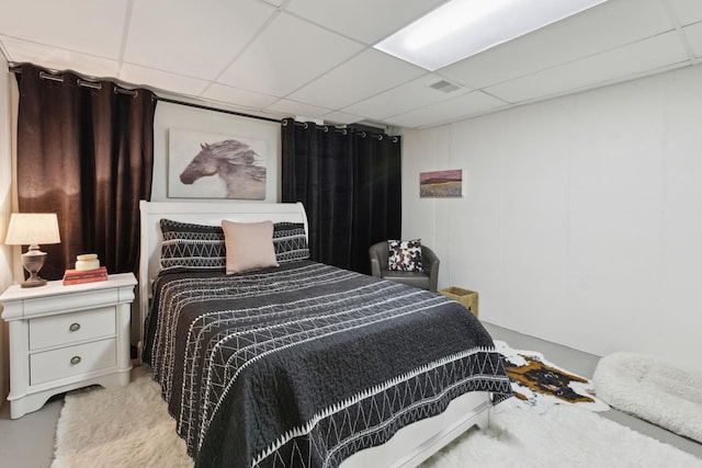 bedroom featuring a drop ceiling